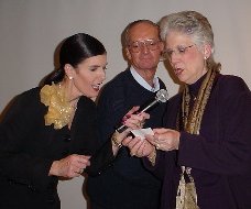 Barb Hill, Hal Newball, and Mary Anne Pick a Name from the Hat.